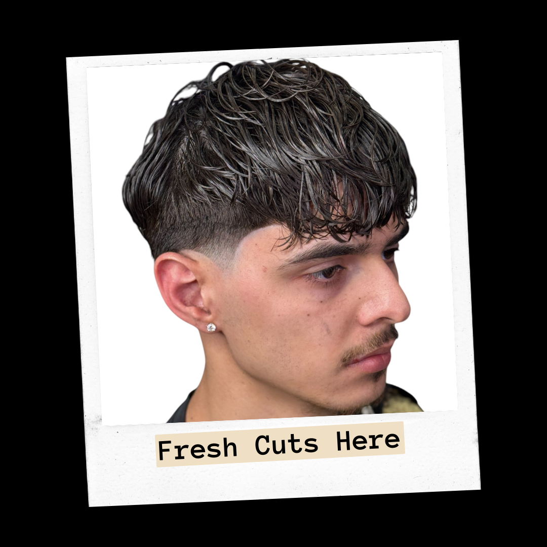 Client photo of a textured fringe cut with a faded side, labeled Fresh Cuts Here