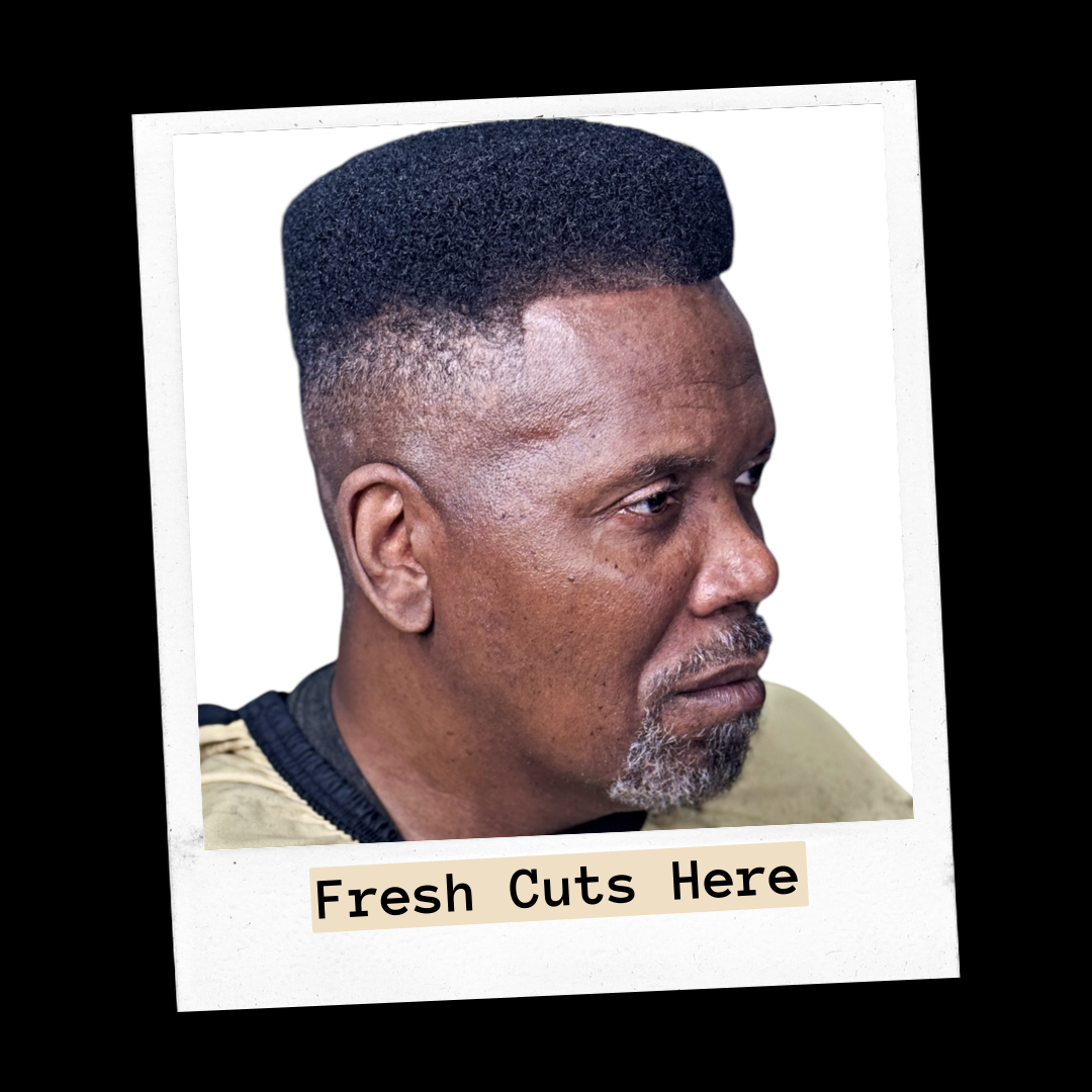 Side view of a flat-top haircut with a faded sides on an older man